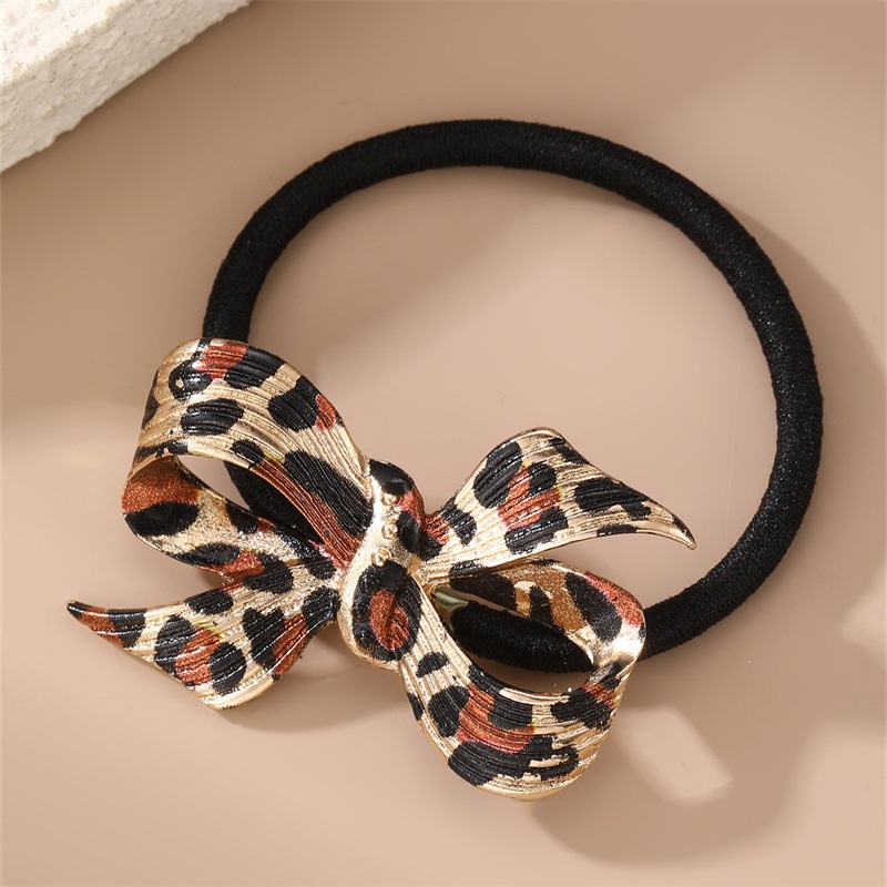Women's High Elastic Bowknot Alloy Pendant Hair Tie Vintage Leopard Print
