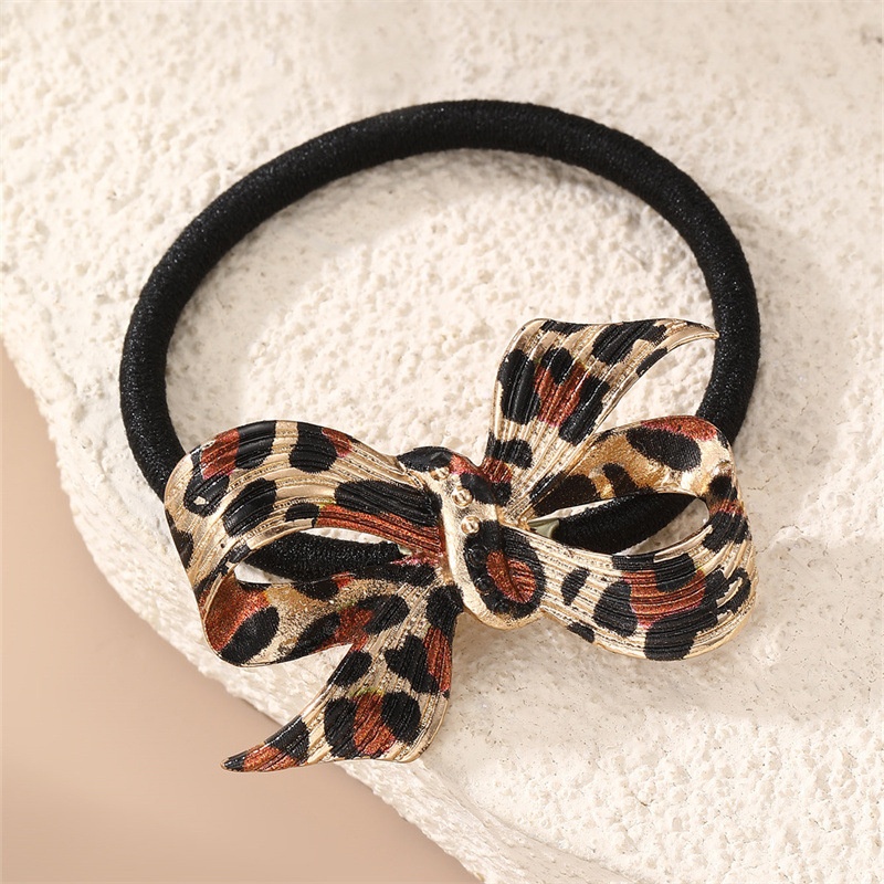 Women's High Elastic Bowknot Alloy Pendant Hair Tie Vintage Leopard Print