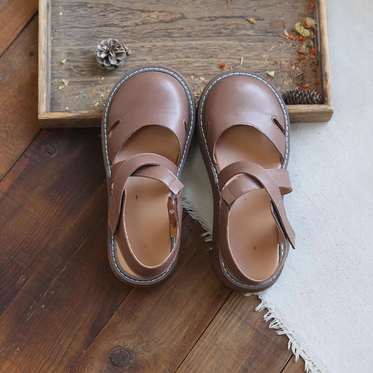 Leather hollow bag head platform big head shoes summer cross strap middle heel Roman sandals