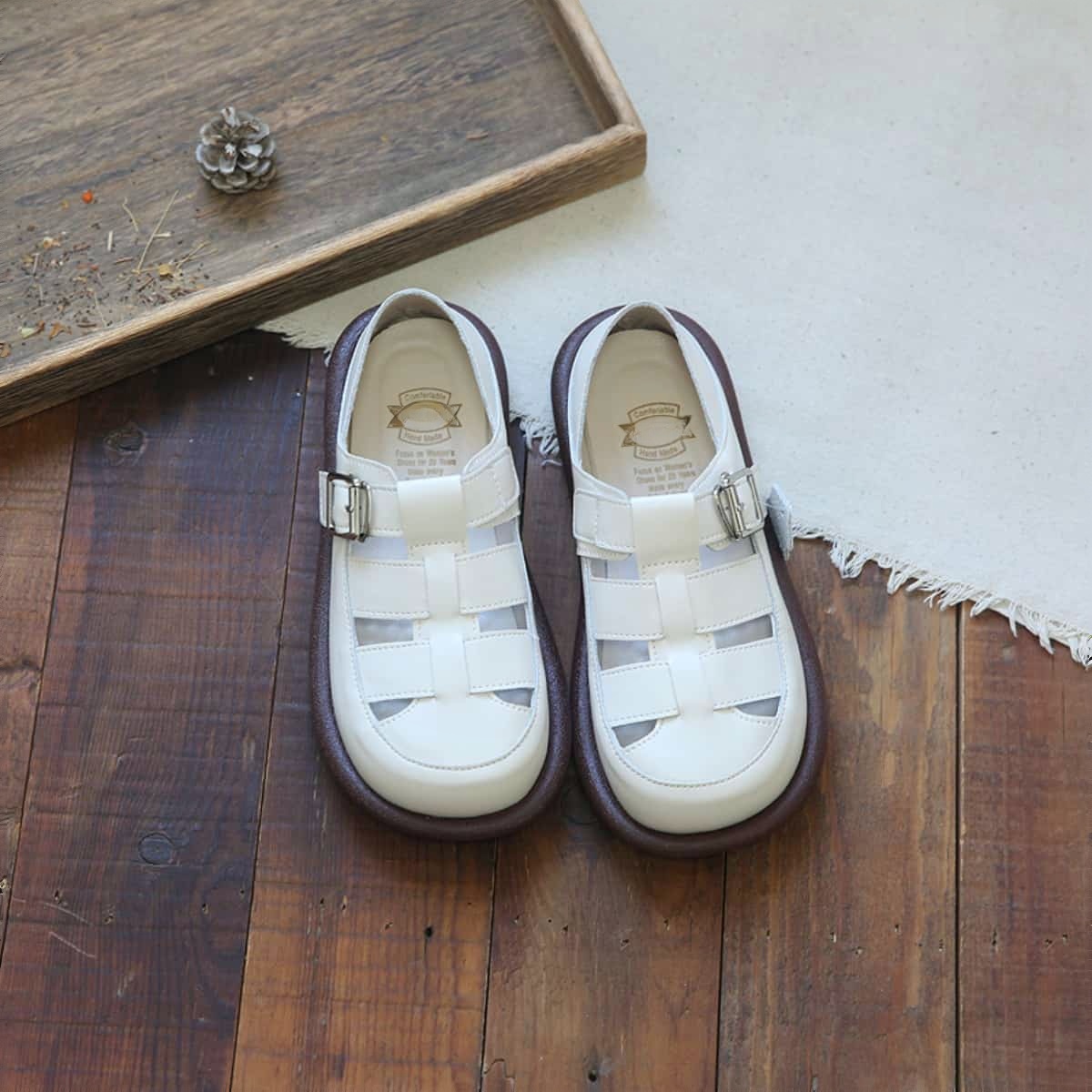 Hollow leather round head flat-soled big head shoes, soft-soled Roman sandals for summer wear