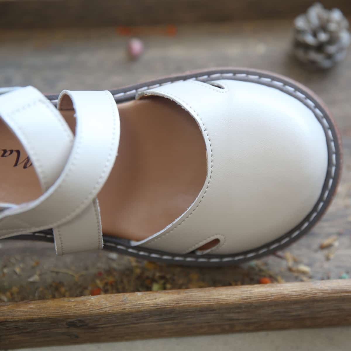 Leather hollow bag head platform big head shoes summer cross strap middle heel Roman sandals